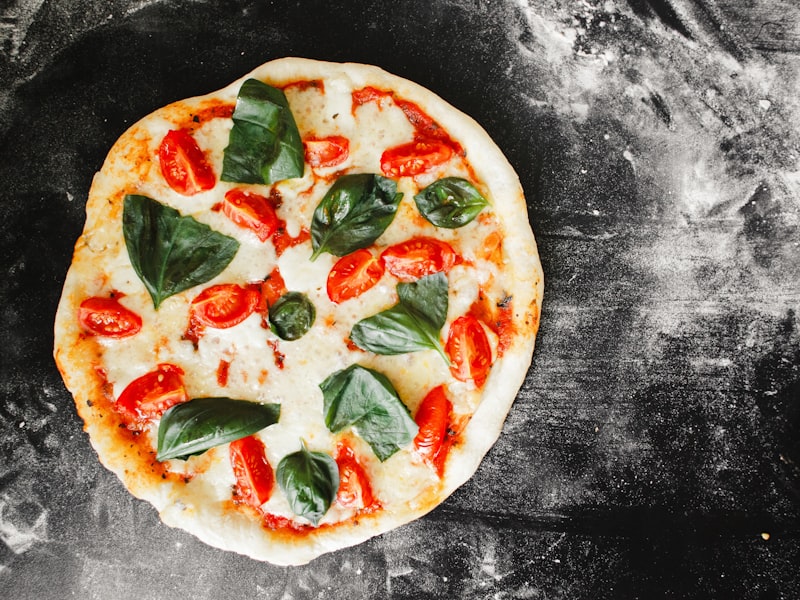 Portuguesa da casa — especialidade da Pizzaria Forneria Bella